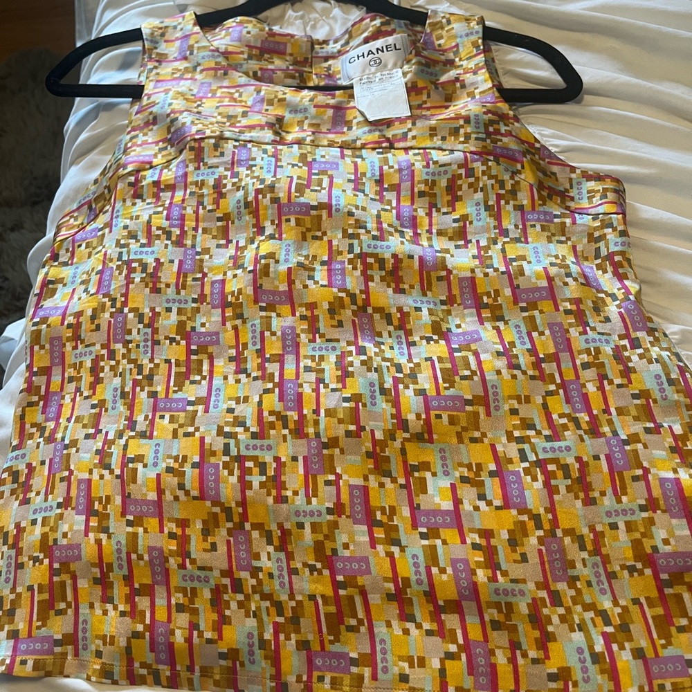 CHANEL all
Over logo silk tank top . Size xs-s